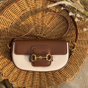 Saddle crossbody