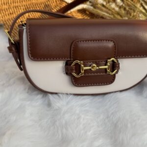 Saddle crossbody